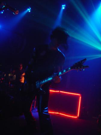 Photo of Biz of the Genitorturers in shillouette that John Schlick was the Lighting Designer for.