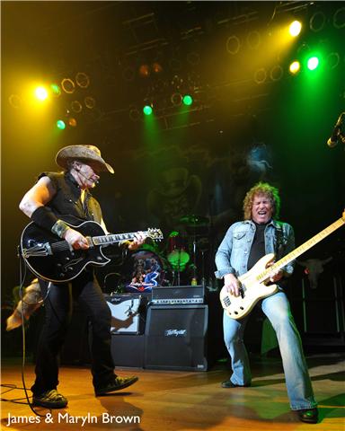Photo of Ted Nugent with Greg Smith that John Schlick was Lighting Designer for.
