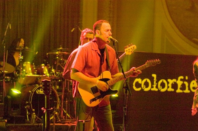 Photo of the Colorfield Stage Right Guitar Player.  Lighting Designer: John Schlick.