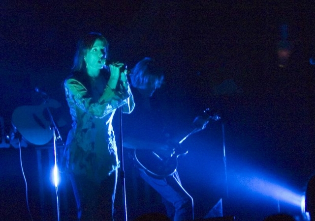 Photo of Colorfield's lead singer lit all in blue.  John Schlick was the Lighting Designer at this show.