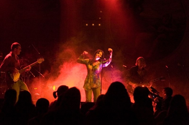 Photo of Colorfield's lead singer lit in red.  John Schlick was the Lighting Designer.