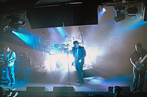 Photo of George, the lead singer of Counterfist taken at a show that John Schlick was the Lighting Designer for.