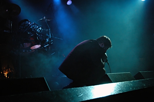 Back shot of George of Counterfist kneeling.  John Schlick was the Lighting Designer for this show.