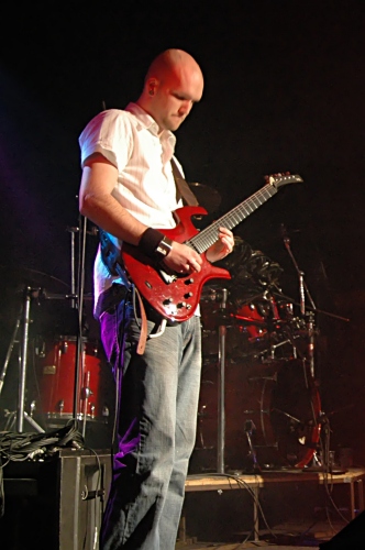 Shot of the guitar player for Counterfist - Well lit from the front.  John Schlick was the Lighting Designer for this show.