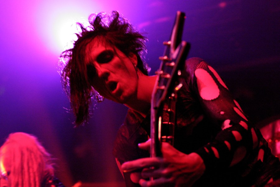 Closeup Photo of Biz of the Genitorturers at the DNA Lounge that John Schlick was the Lighting Designer for.