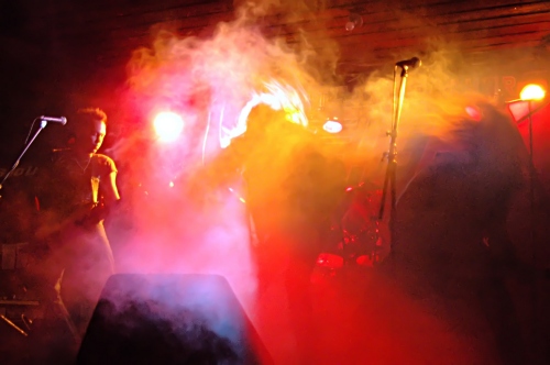 Behind the stage photo of Hot For Teacher with hair flying everywhere.  John Schlick was the Lighting Designer.