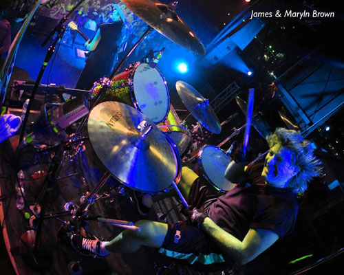 Photo Wild Mick Brown playing with Ted Nugent that John Schlick was Lighting Designer for.